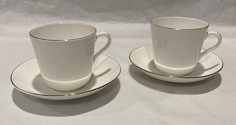 Two Classic White Gold Rimmed Cups and Saucers